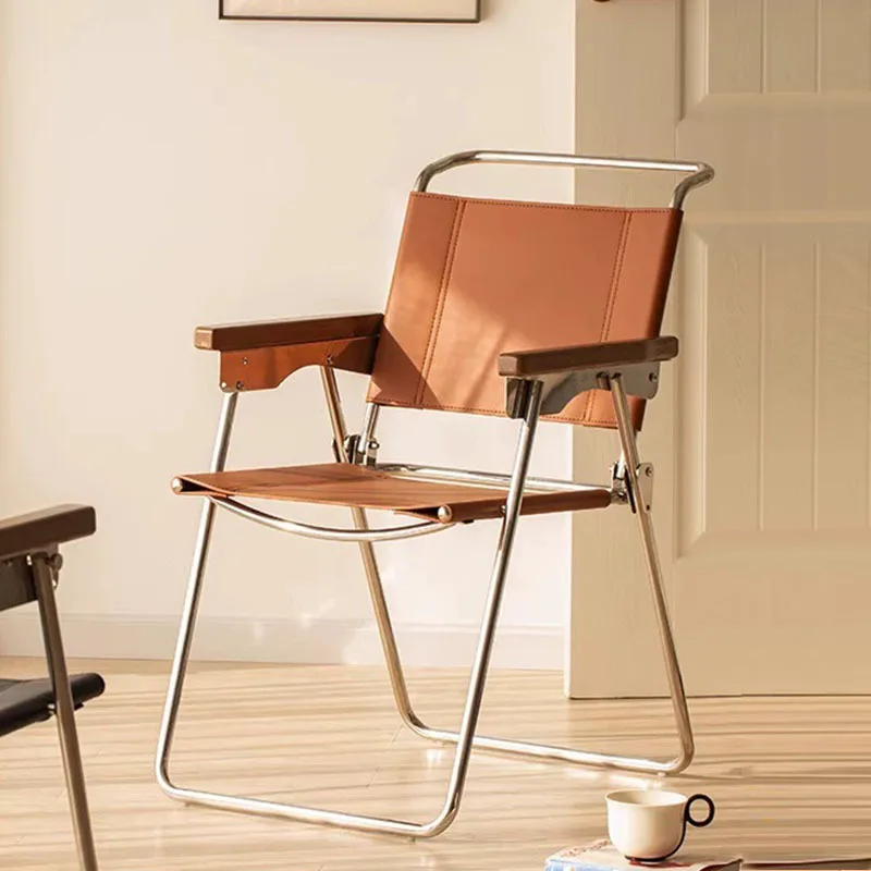 

Nordic medieval dining chair home designer stainless steel saddle leather leisure chair folding chair armchair