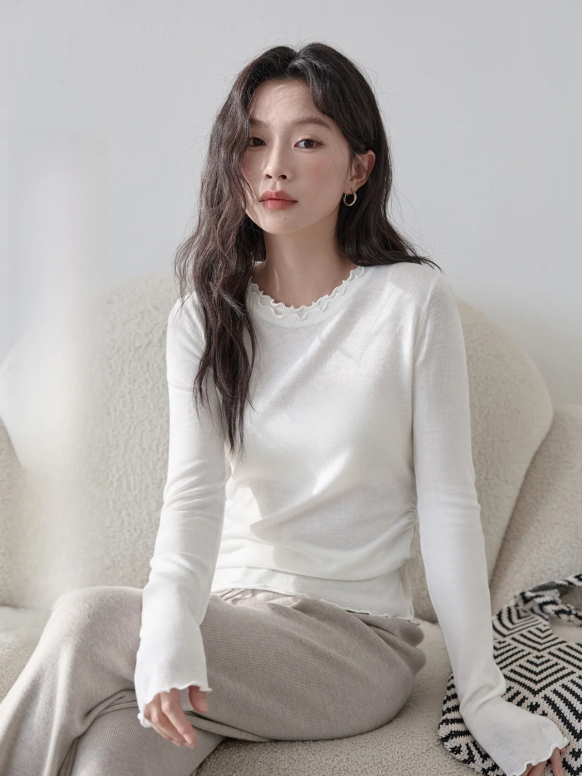 

Huixi Peach Knitted Long Sve Base irt Women's Faion Spring New Wood ain e Versatile Top