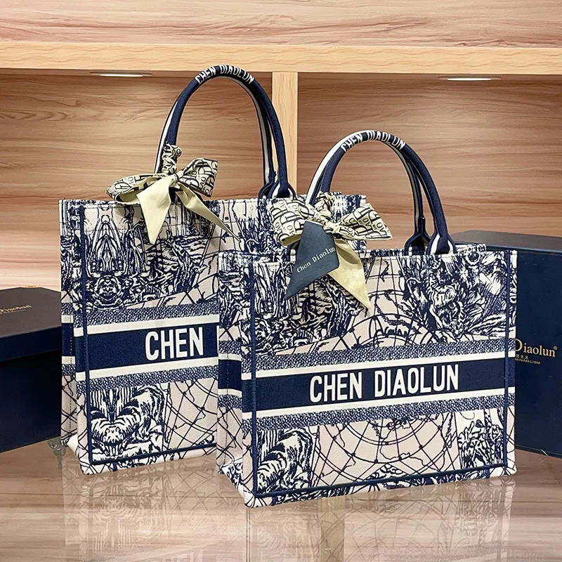 

Качественная пригородная холщовая атмосферная женская сумка, большая вместительная сумка-тоут с вышивкой, новинка 2025 года, портативный женский портфель