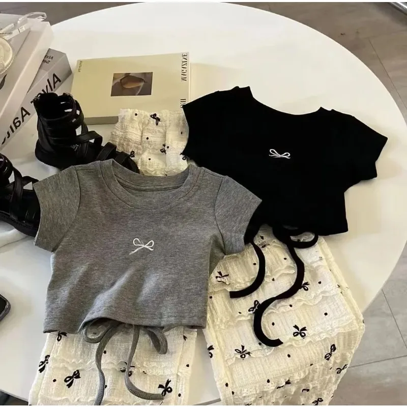 

Childrens Sets Girl Summer New Baby Backless T-shirt Fashion Trousers Causal Time Two Pieces 2025 Simple Round Collar