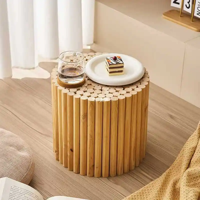 

log style coffee table, living room floor ornaments, solid wood on both sides of the sofa, soft decorations in the B&B room