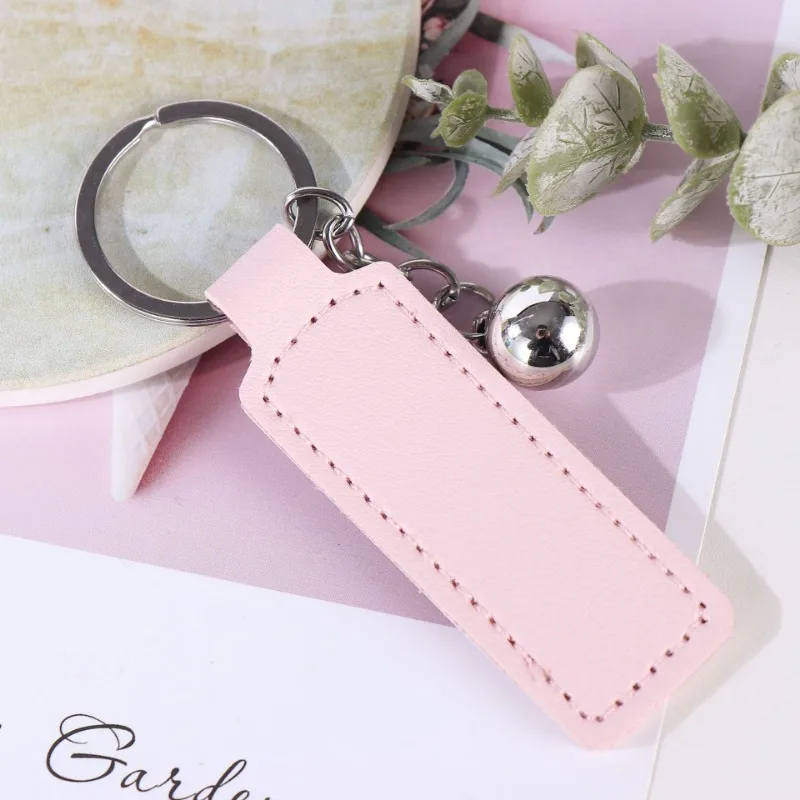 โลโก้ที่กําหนดเองพวงกุญแจเปล่า PU หนังเลเซอร์แกะสลักพวงกุญแจรถอุปกรณ์เสริมหลายสีส่วนบุคคล Key Chains