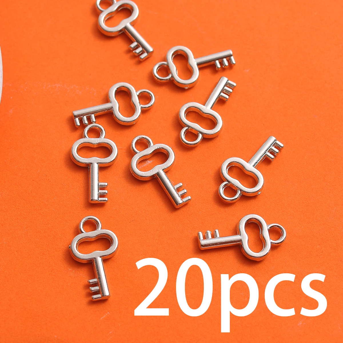 20-Piece Set of Hollow Key Pendants with Single Hanging Hole, Simple Hollow-Out Key 3D Design, Suitable for DIY Bracelets, Necklaces, Earrings, and Handmade Weaving Accessories