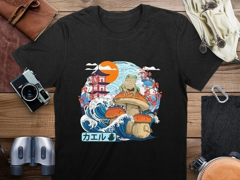 

Japanese Wave Frog Illustration T-Shirt, Unique Anime Style Art Tee, Nature Inspired Fashion, Unisex Graphic Shirt