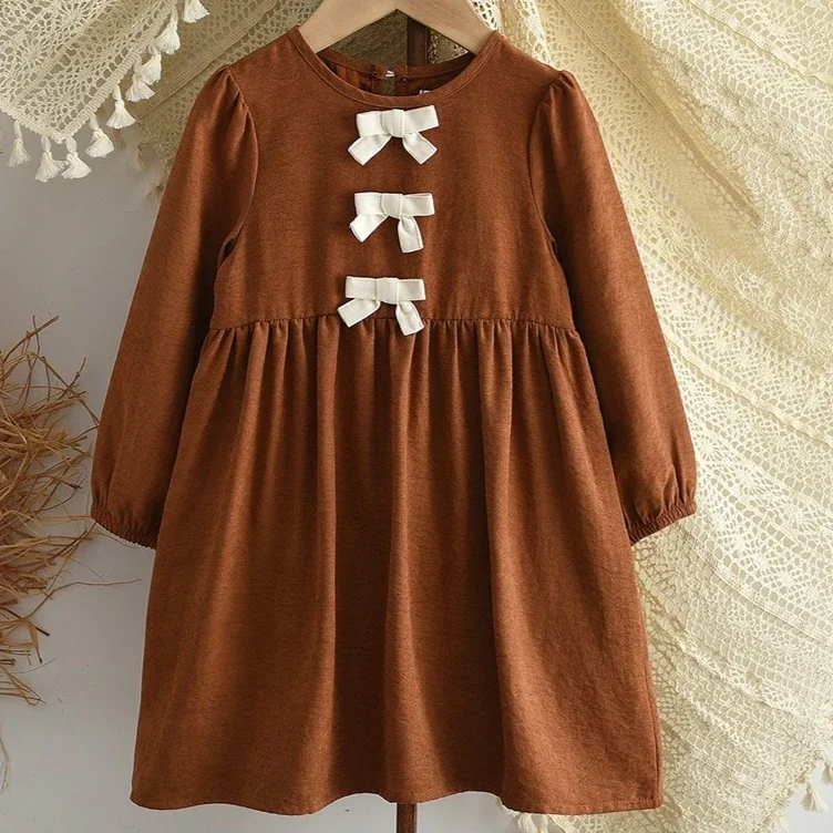 Girls Skirt 2026 Spring And Autumn New Childrens Clothes Girls Baby Sweet Fashion Bow Round Neck Long Sleeve Skirt Simple