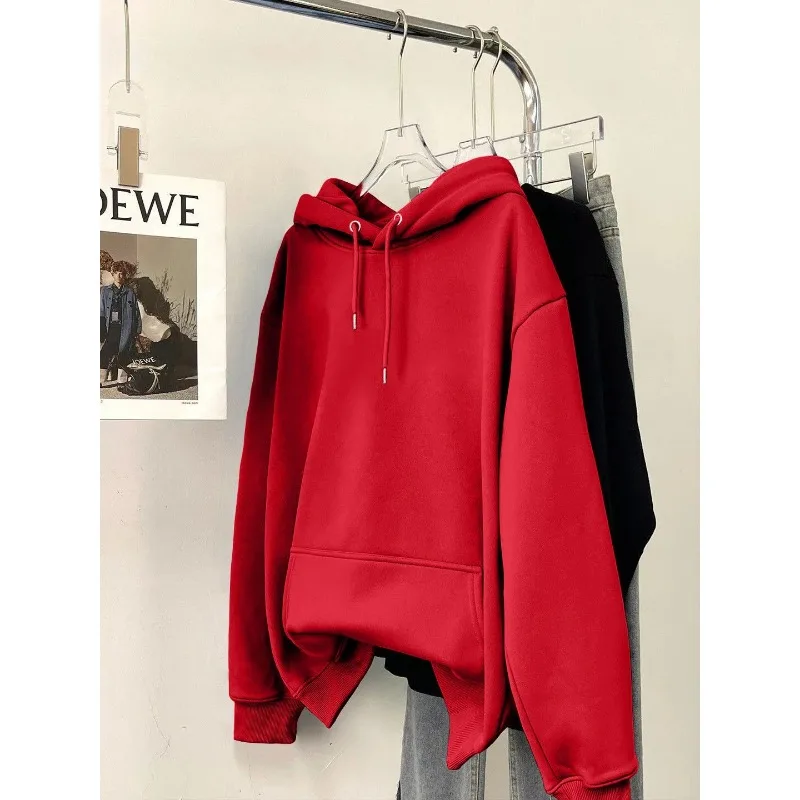 ファッショナブルなルーズソリッドカラー長袖スウェットシャツ女性用秋と冬ベルベット厚みのあるデザインフード付きトップ