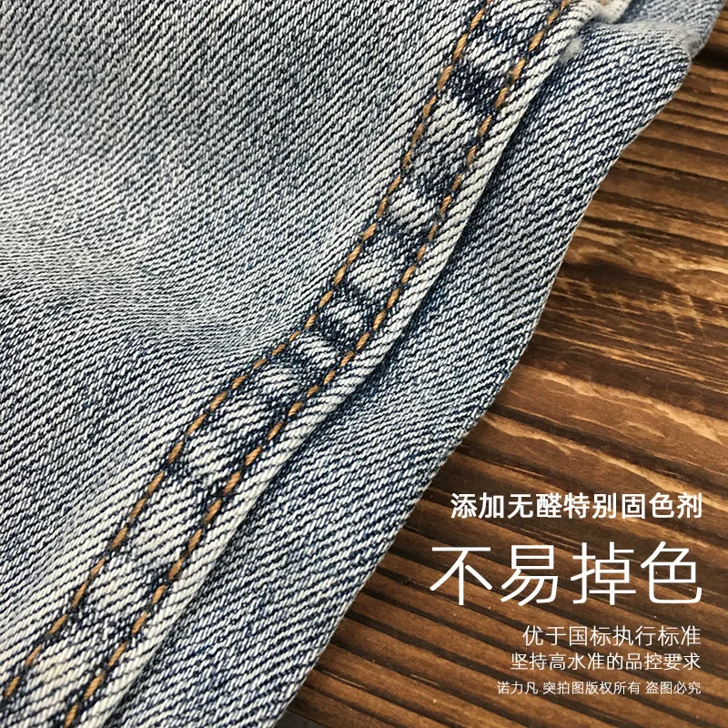High end light luxury retro light colored jeans for men's spring and summer 2025 new style slim fit small foot elastic pants