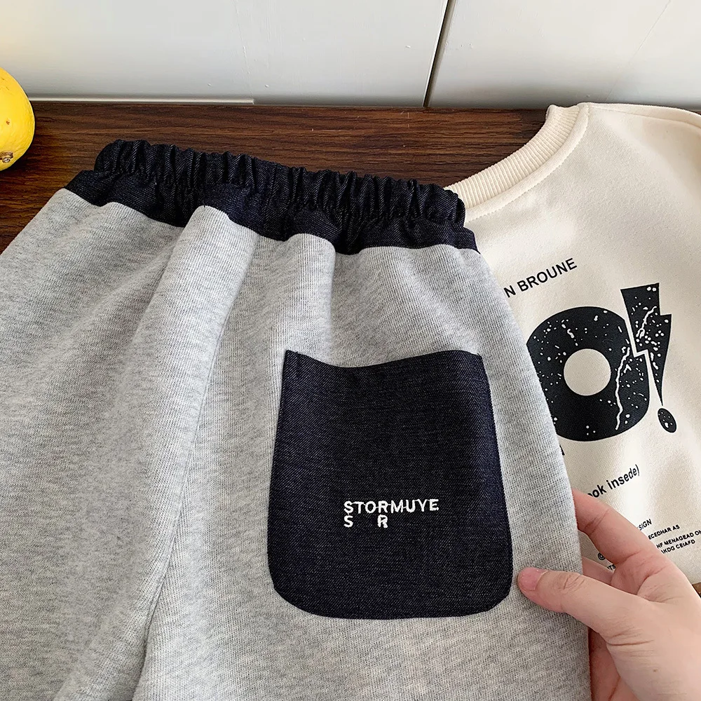 أطفال طفل الفتيان Sweatpant 2025 الشتاء الكورية طفل الفتيان بنطلون إلكتروني طباعة عادية رشاقته الدافئة الأطفال 3-8Y الفتيان بانت