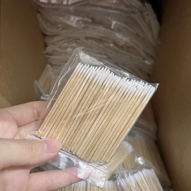 Bastoncillos de algodón de madera para limpieza de orejas, delineador de cejas, labios, tatuaje, maquillaje, herramientas cosméticas, joyería, palos de limpieza, 100 unids/lote por bolsa