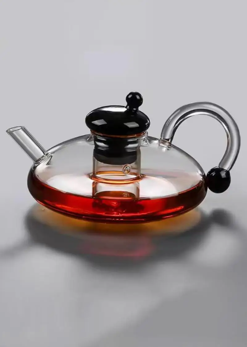 Heat-Resistant Glass Teapot with Black Teacup Transparent Kettle Tea Set with Tea Infusion Filter For Home Boiling Tea