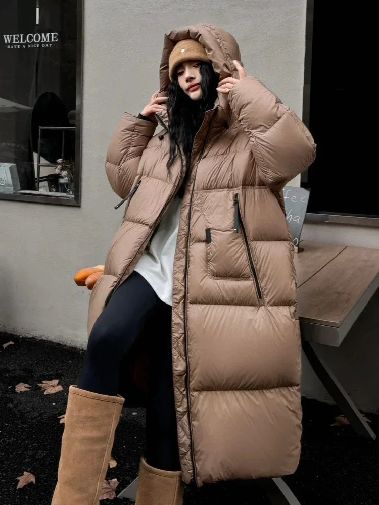 Femmes nouveau automne hiver épaissi chaud vers le bas vêtements dame longue à capuche moelleux doudoune mode décontracté vers le bas manteau femme 2025