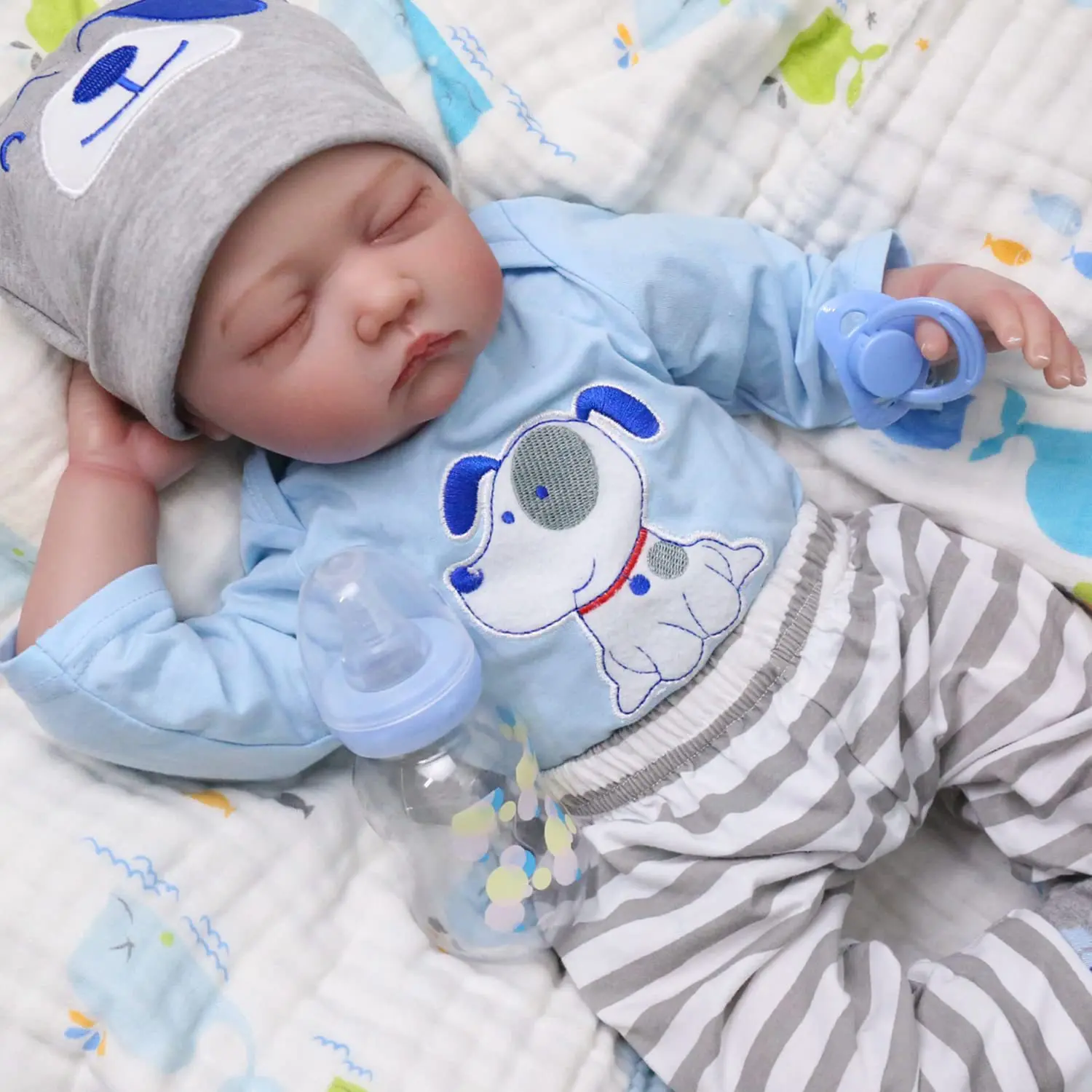 22-Inch Vinyl Reborn Doll | Cartoon Striped Outfit, Closed Eyes, Posable, Realistic Skin & Facial Features, Collectible,