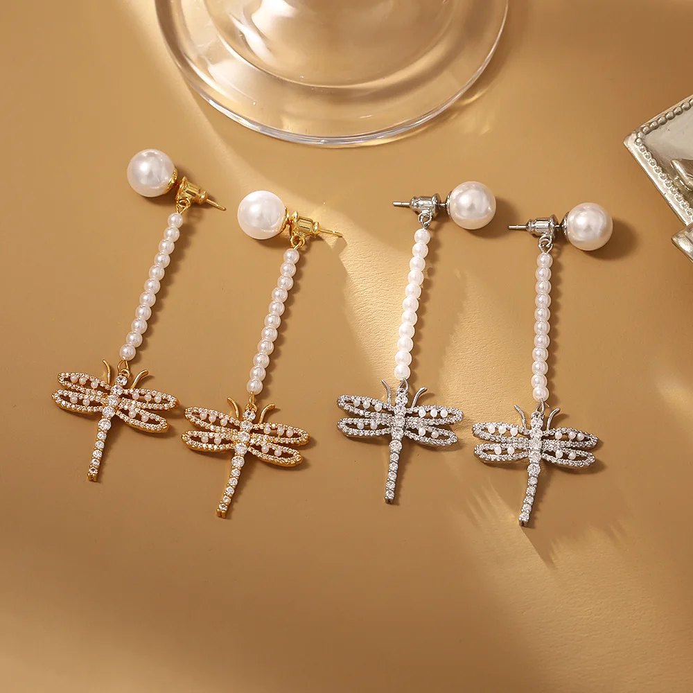 

Fashionable and exquisite retro pearl earrings hollow dragonfly inlaid with zirconium long earrings niche light luxury earrings