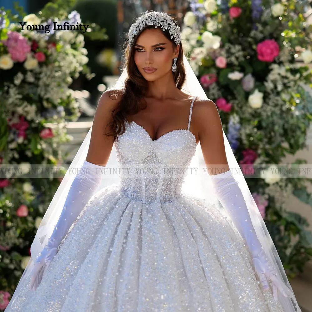 Vestidos de novia románticos 2025 vestido de novia tela brillante con cuentas ropa Formal de novia larga espagueti sin espalda cariño