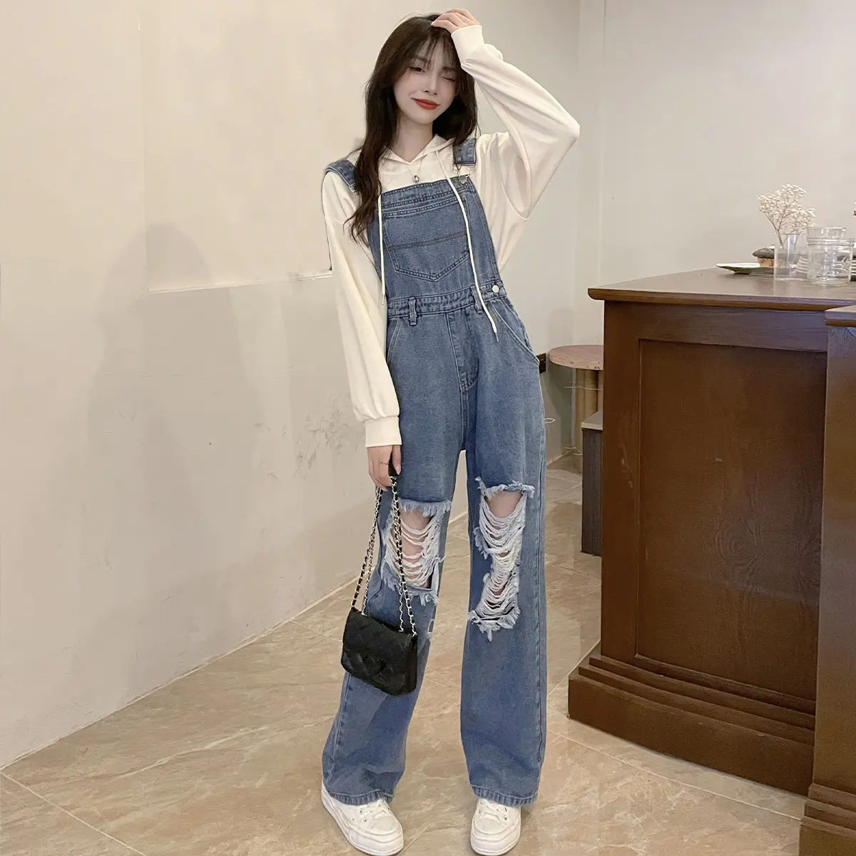 Dongdaemun coreano verano americano High Street Retro Ripped Denim monos sueltos adelgazantes aspecto mono pantalones para mujeres