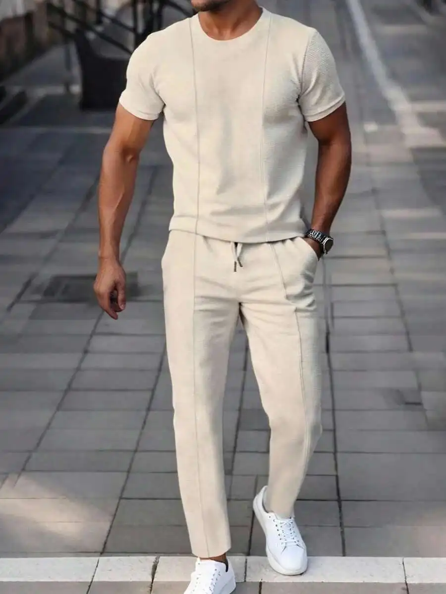 

Beige Two-Piece Men’s Summer Set: Short Sleeve Crewneck Top And Drawstring Pants, Comfortable Casual Coordinating Outfit