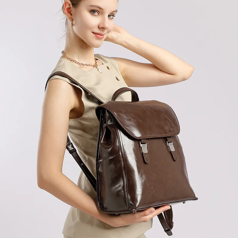 Genuine leather casual ladies' hand-held high-end backpack, simple and large-capacity flip-top lock business men's backpack