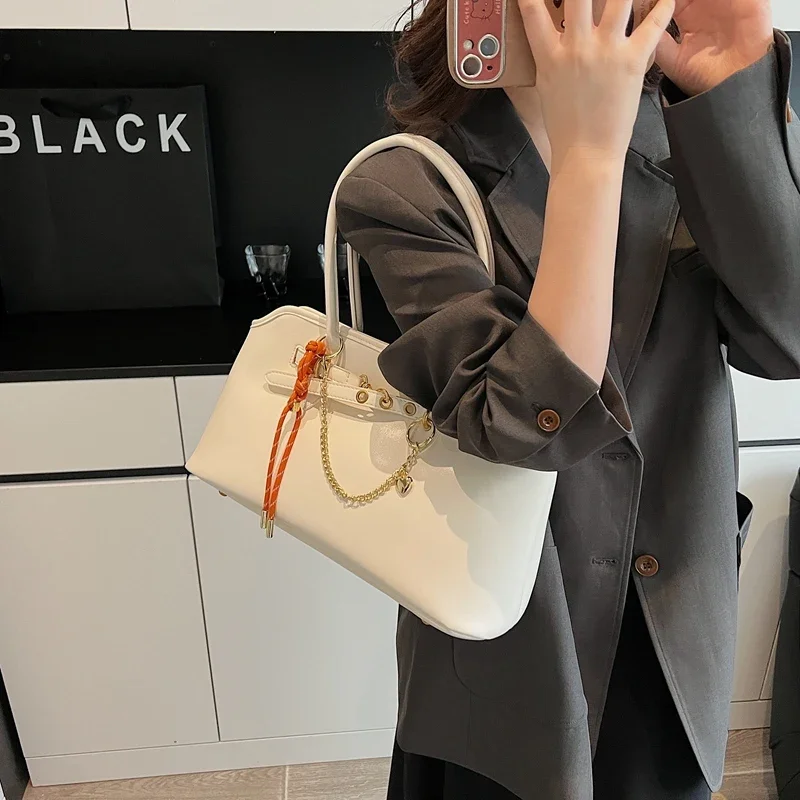 

Стильная высококачественная минималистичная сумка-шопер для женщин, винтажная уникальная кожаная сумка через плечо, однотонная, большой вместительности