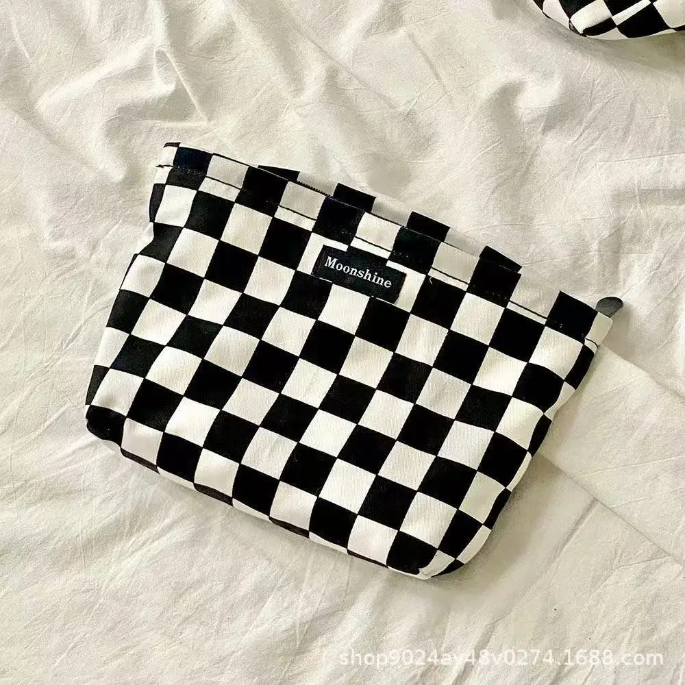 Advanced black and white checkered makeup bag Large capacity milk storage bag Portable everything checkerboard toiletry bag image 6
