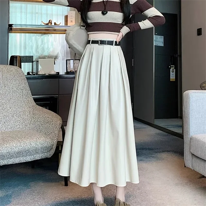 أسود فو بولي Leather جلد المرأة ألف خط التنانير 2026 جديد الخريف الشتاء عالية واسط الصلبة شيك مظلة مكتب التنانير الإناث #2