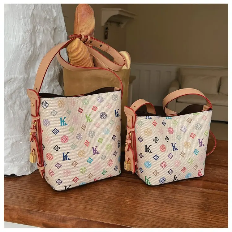 trendy-design-diaper-bag-for-women-letter-logo-leather-shoulder-bag-large-capacity-elegant-minimalist-commuter-fashionable-tote