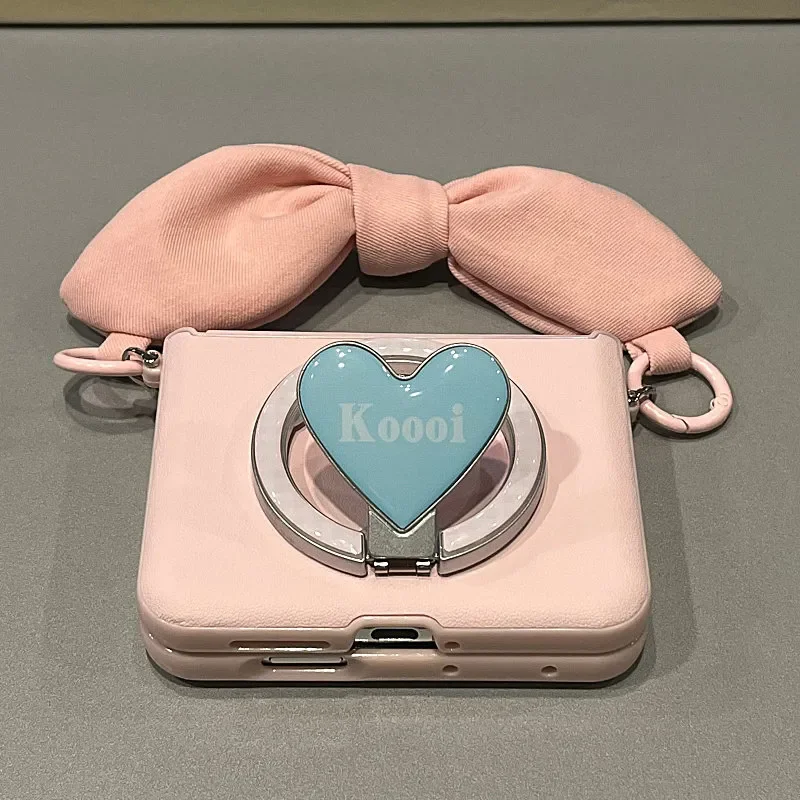Pink Leather Magnetic Heart Ring Stand Phone Case Bow Hand Strap Foldable Cover For Samsung Z Flip7 Z Flip6 / Xiaomi Mix Flip