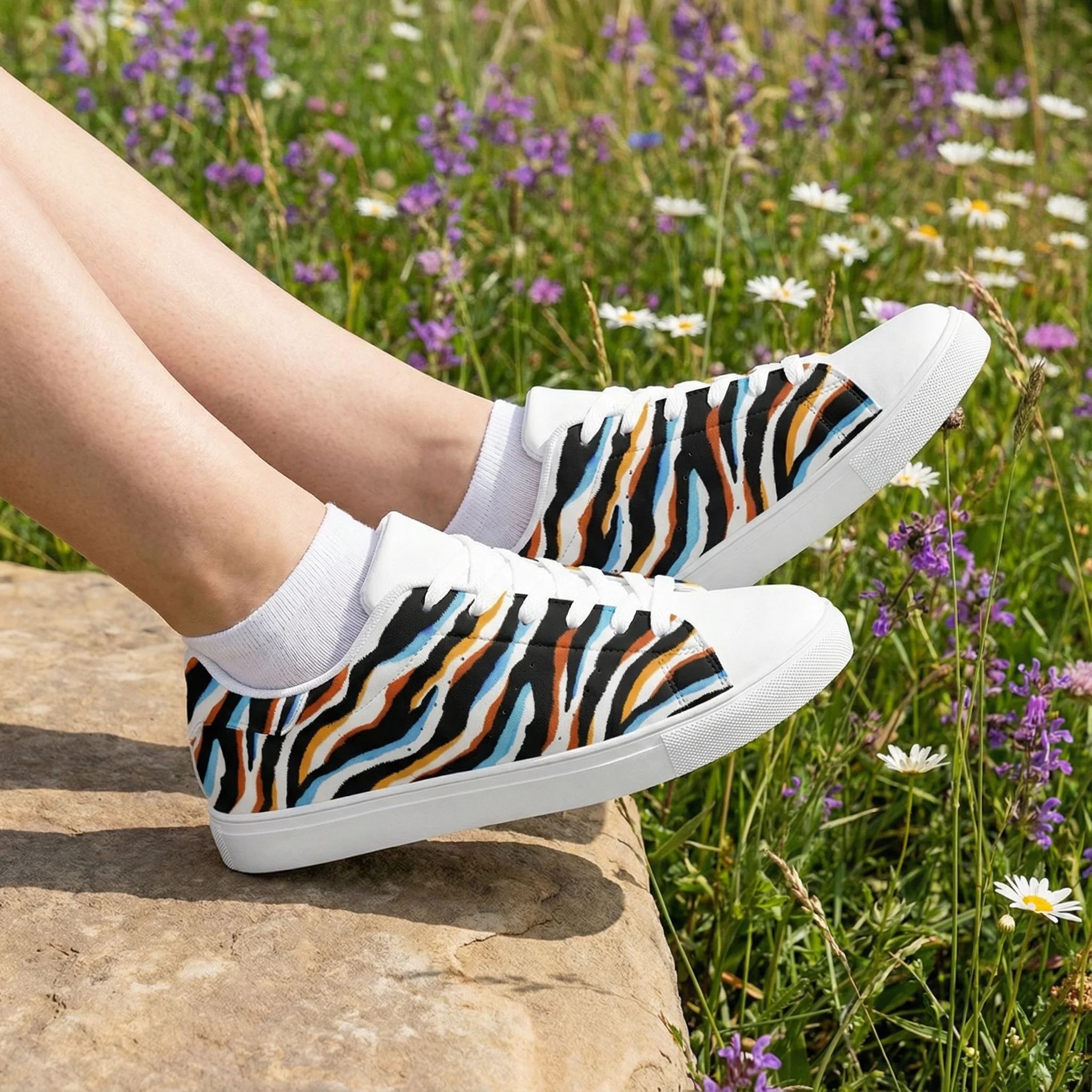 

Casual sneakers with a camouflage zebra print, combining elegance, comfort, and style.