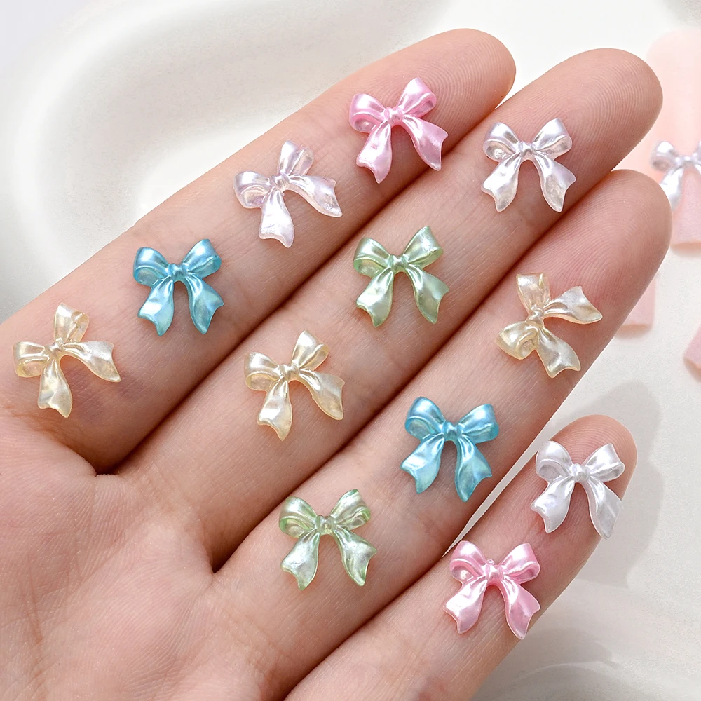 100pcs Pearl Color Ribbon Bow Nail Art Charms 3D Pearly White Glossy Bows Nail Decoration 10mm Aurora Bowknot Nail Art Supplies