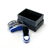 Mini sports shoe keychain, mobile phone key pendant, sports shoe gift box set, double lace box, creative personalization