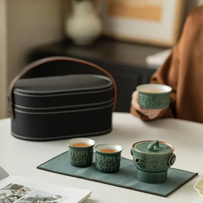 

Chinese Sanxingdui Culture Portable Travel Teaset Kit Zen Tea Maker Teapot And Cups Outdoor Portable Leather Bag Tea Accessories