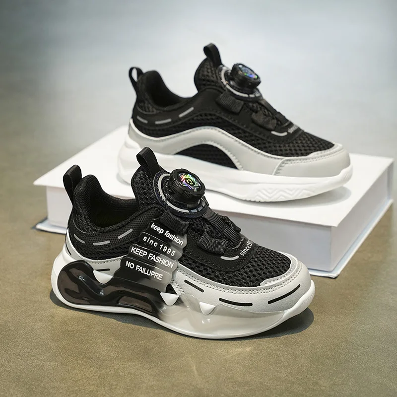 A pair of children's sports shoes, with a durable sole and a rotating button design for a casual styleTL-2301-2