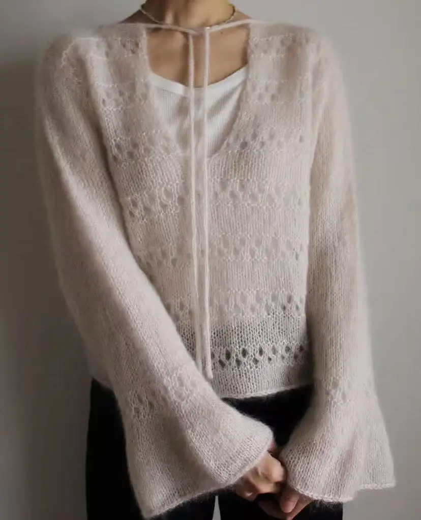 

Heavy industry hollowed out knitted sweater for women, loose and lazy style, 2026 pullover loose beige knitted vacation series