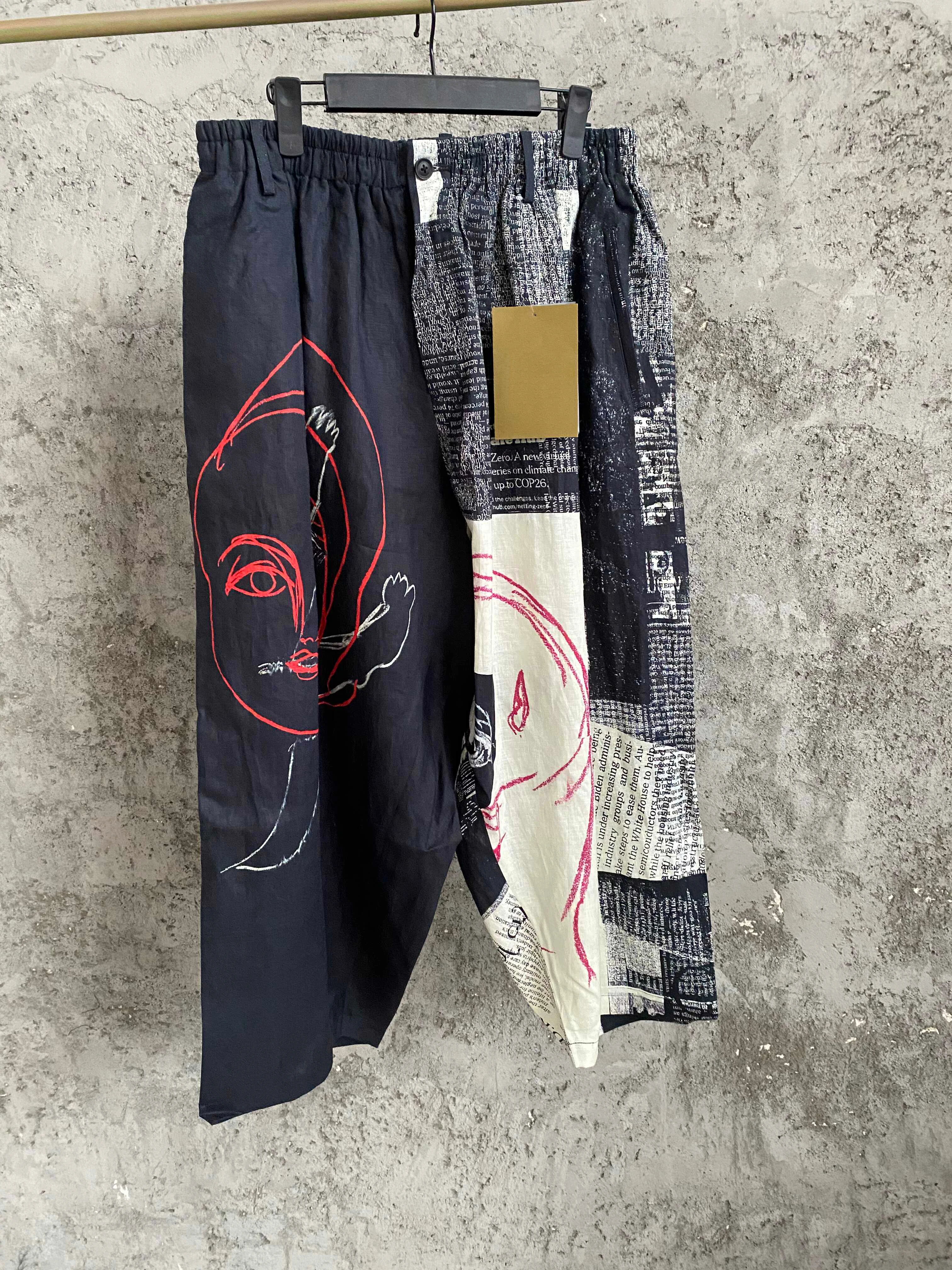 

TOP-YAMAMOTO Yuka Asakura floral printed ankle-exposing pants. Ankle-exposing wide-leg pants are niche