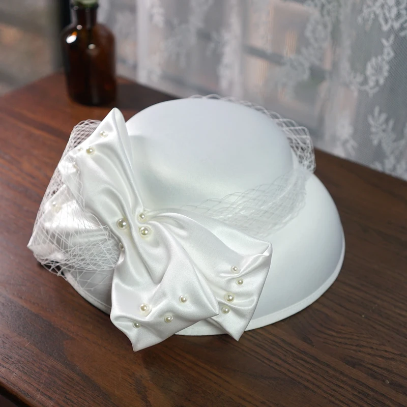 French Elegant Ladies White Satin Deep Fedoras Large Pearl Bow Face Veil Fascinators Big Wedding Hat Bride Party Hat Headdress