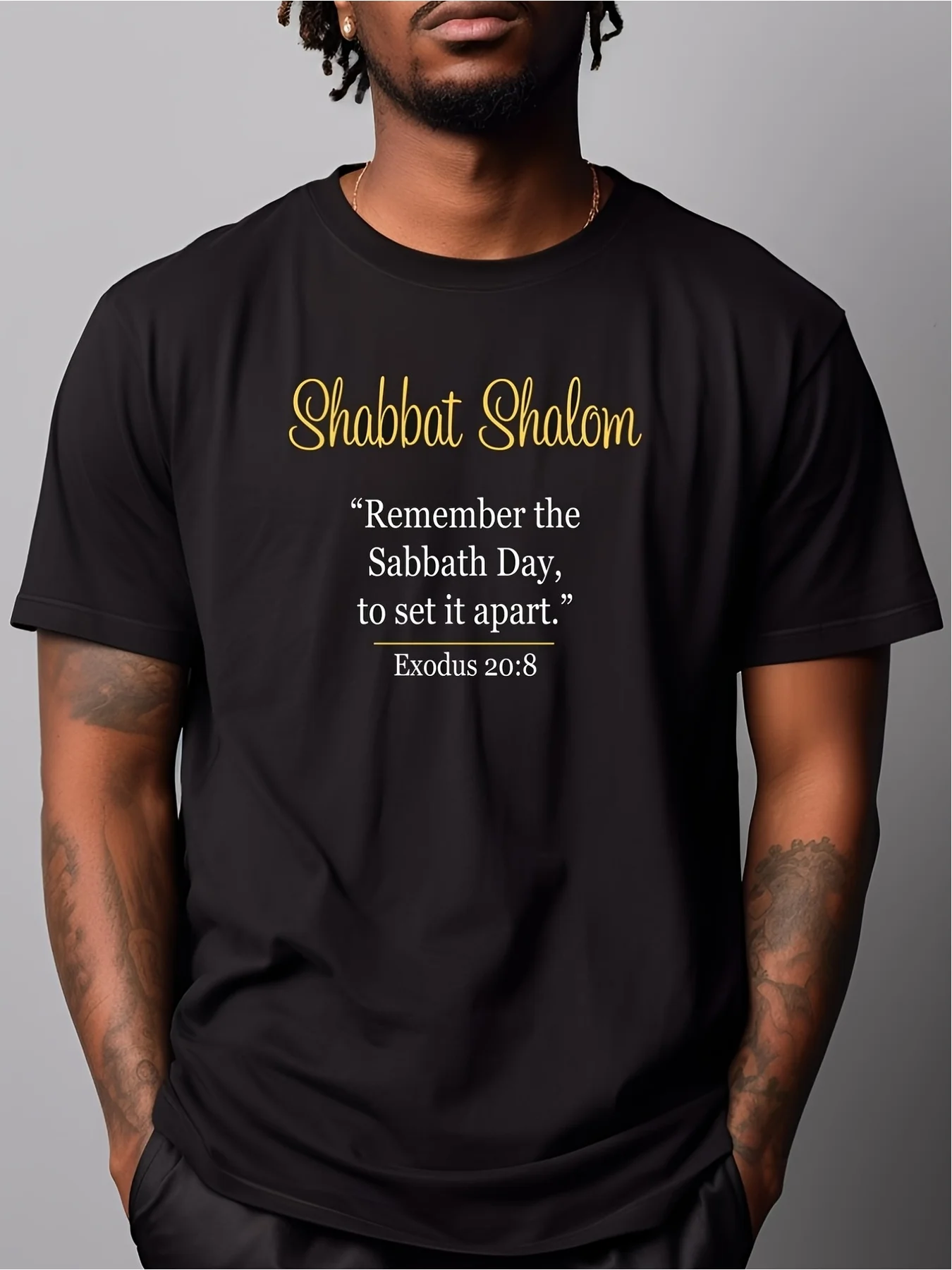 Shabbat Shalom T-Shirt, Black with Golden Hebrew and English Print, Made From Soft Breathable Fabric. This Crew Neck Sleeved Tee Offers A Regular Fit for Adults, Perfect for Sabbath Day Wear