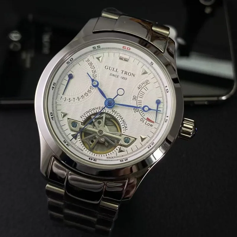 ساعة رجالية ميكانيكية أوتوماتيكية بحزام فولاذي للأعمال متعددة الوظائف وتقويم الاستقرار في الغلاف الجوي وعرض الطاقة الحركية