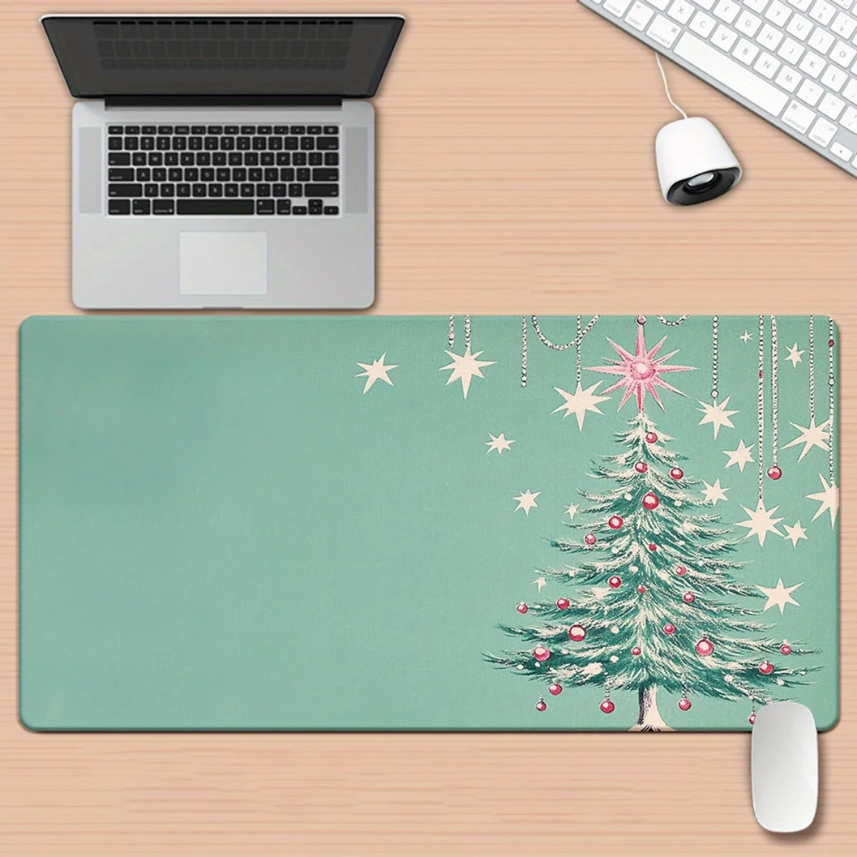 

The Christmas tree mouse pad features an extra-large anti-slip base with a green tree design, suitable for gamers and families
