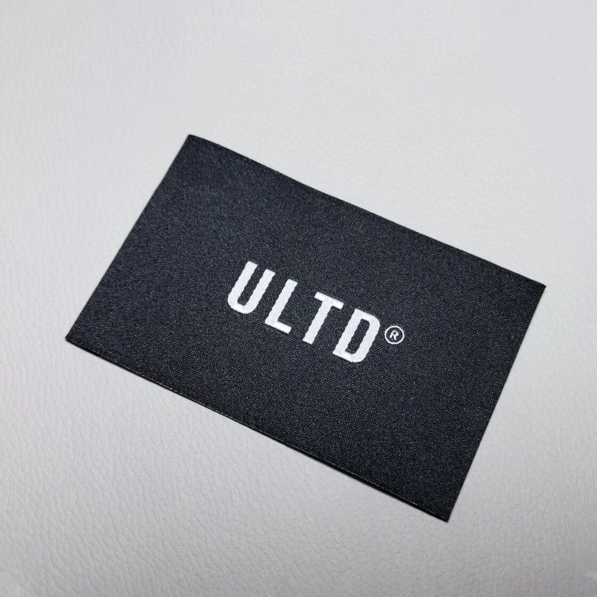Custom High Density Woven Labels Embroidery Fold Woven Tags for Coat Apparel Brand Logo Custom Clothing Labels