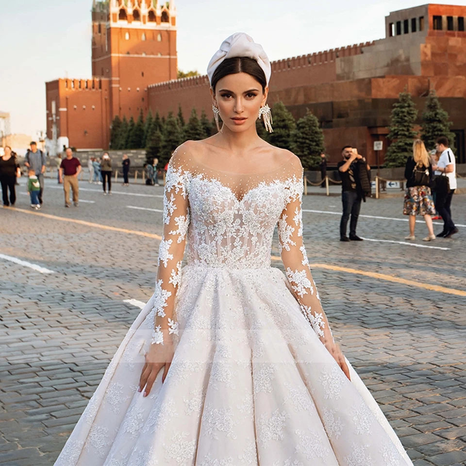 2025 Abiti da sposa bianchi a maniche lunghe per le donne Appliques Abito da festa formale senza schienale Elegante strascico di corte Abiti da sposa