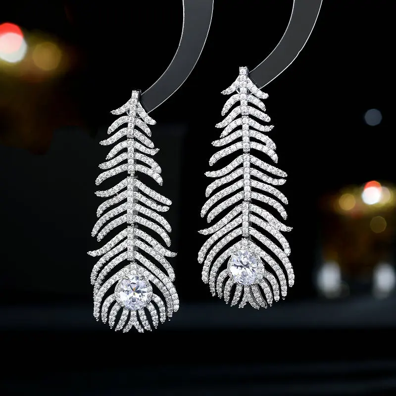 

Европейская и американская мода, новые французские ретро высококачественные серьги с циркониевыми перьями, легкие роскошные стильные преувеличенные тяжелые серьги для рукоделия