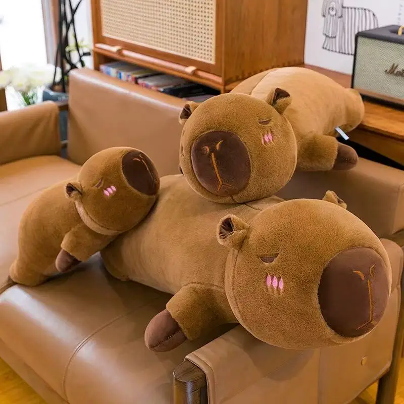 60 cm-100 cm Kawaii dibujos animados tira gigante Capybara muñeco de peluche almohada tumbada marrón naranja alas creativo Capybara juguete de peluche decoración del hogar