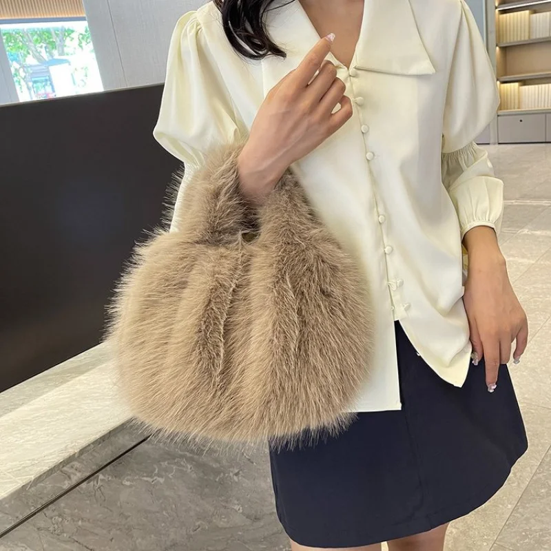 Semplice ed elegante 2025 nuova borsa tote in pelle di marca di lusso da donna famoso designer popolare semplice casual ​