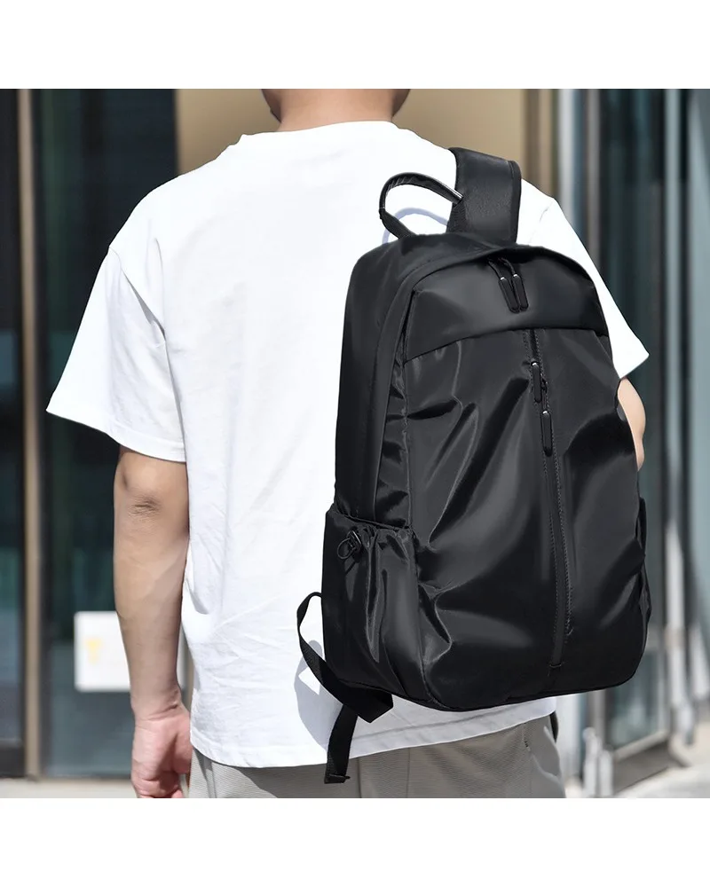 

New version of large-capacity men's backpack business leisure travel computer bag Korean version solid color going out charging