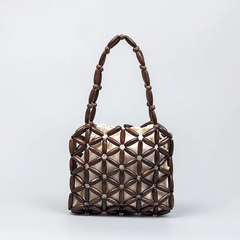 

Retro new woven bead bag, fashionable hollow out high-end women's bag, niche design, simple and versatile bag