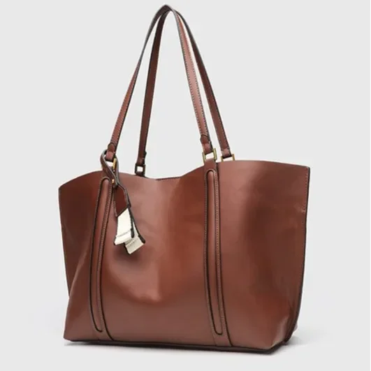 Nuevo bolso de mano para mujer 2025, bolso de hombro individual para ir al trabajo de gran capacidad para ir de compras y trabajo, Material de poliuretano transfronterizo