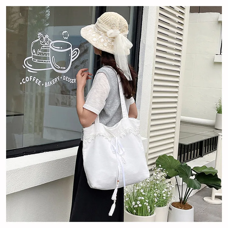 2025 arco arte renda bordado bolsa de ombro de grande capacidade elegante, versátil, bolsa de axilas de alta qualidade para mulheres