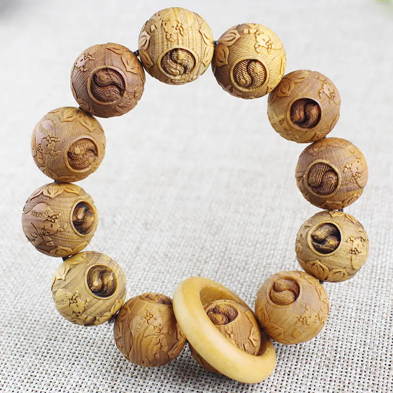 Aged Chinese cypress wood bracelet with carved Buddhist beads, a wooden cultural item for men, featuring the Eight-Trigram desig