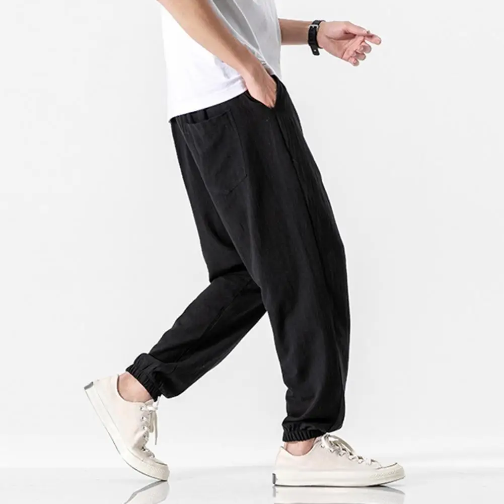 

Solid Color Men Trousers Retro Men's Ninth Pants with Side Pockets Elastic Waist Drawstring for Gym Training Jogging Solid Color