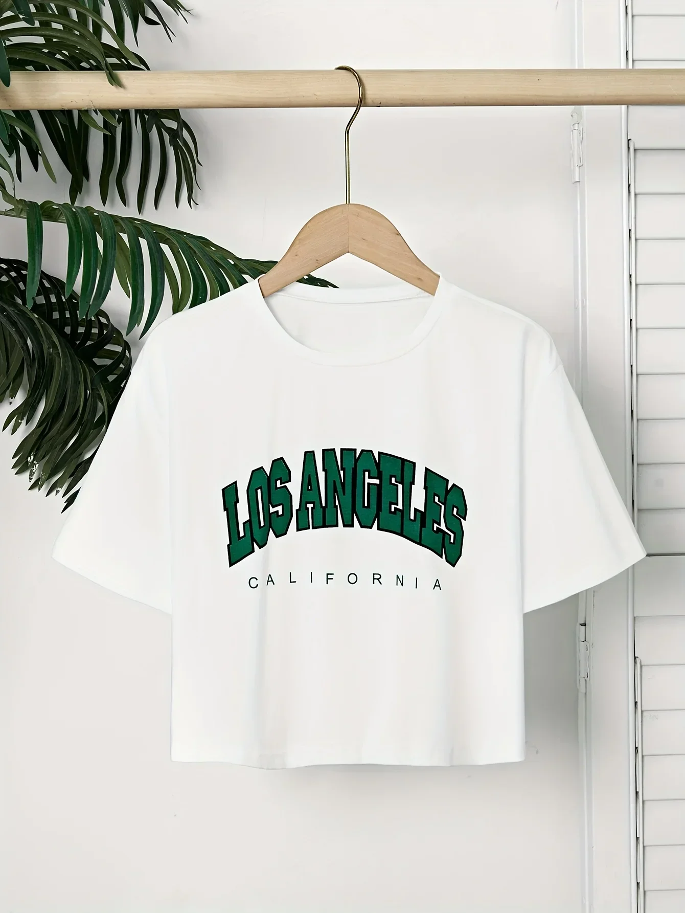 Manga branca com estampa de letras verdes poliéster leve feminino Los Ángeles Califórnia malha casual gráfico