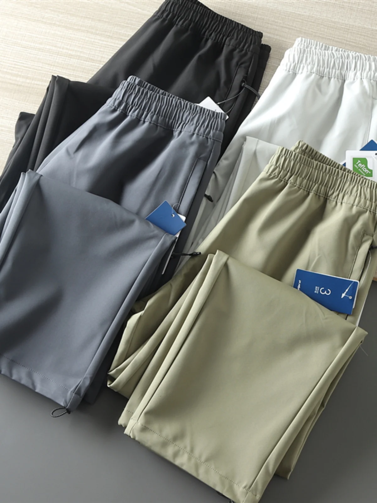 

Tech Three-in-One Fabric Outdoor Windproof Waterproof Soft Casual Sports Pants Three-Proof Fabric Stereo Tailoring